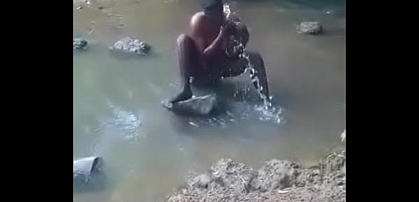  hot african woman taking bath